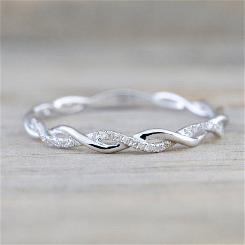 Loop half diamond ring