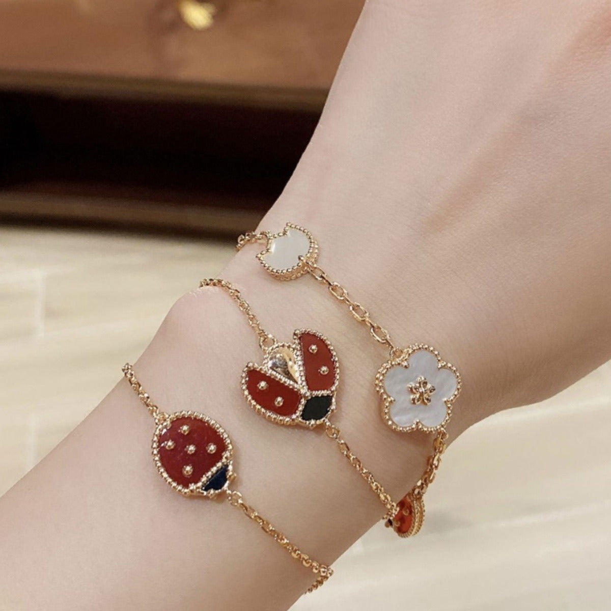 Seven-star ladybug five-flower rose gold bracelet