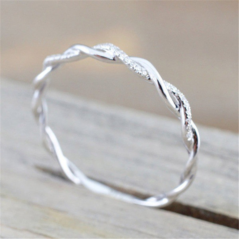 Loop half diamond ring